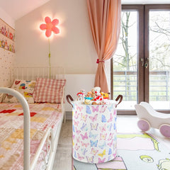 FXOCSHE Butterfly basket open-top in bedroom ready for toys and clothes.