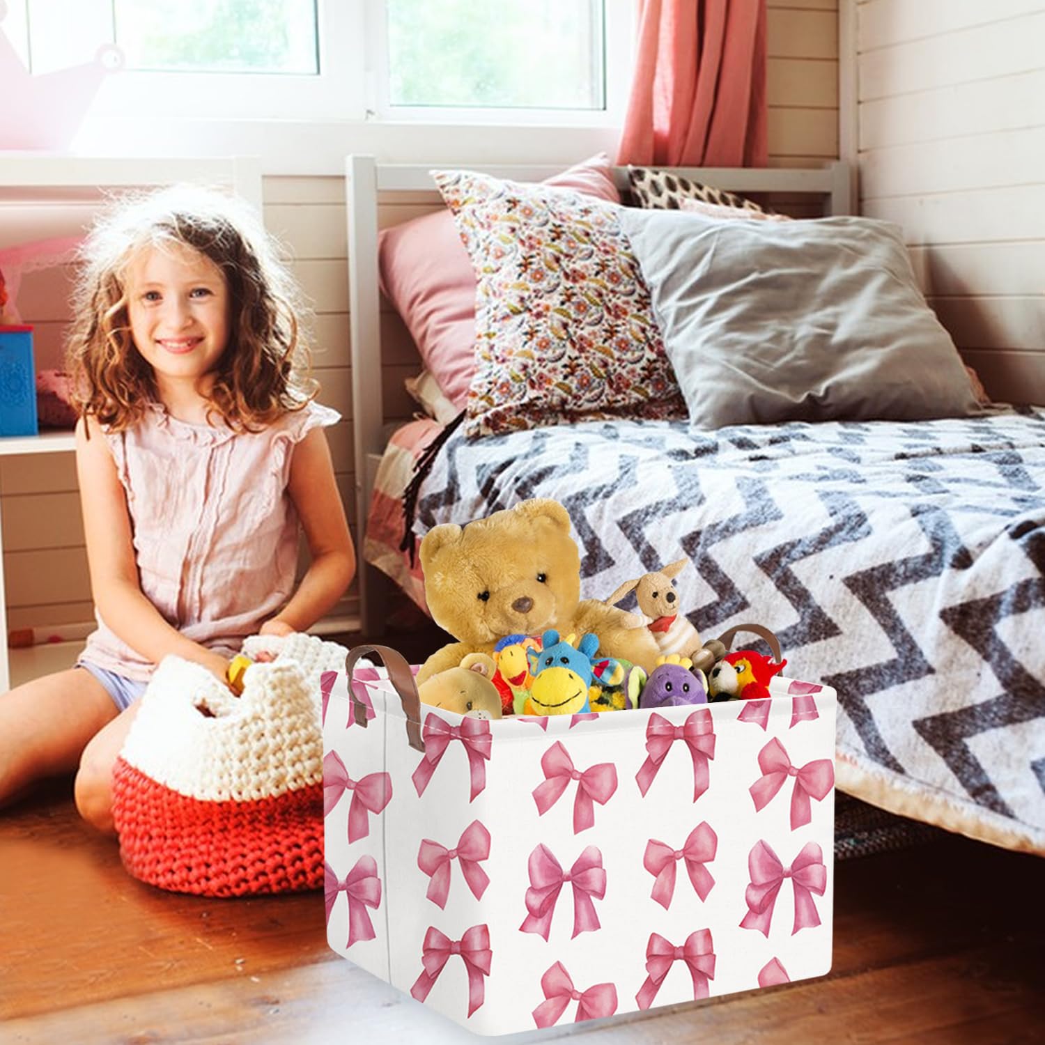 FXOCSHE pink laundry hamper fits toys and clothes in a girls' room.