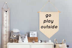 FYSIA Go Play Outside pennant banner at front door creates welcoming entry