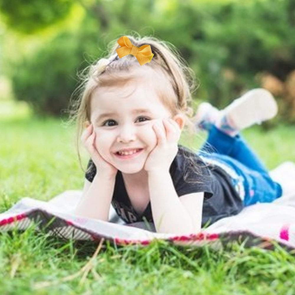 FZBNSRKO random color baby hair clips shown in cheerful toddler colors.
