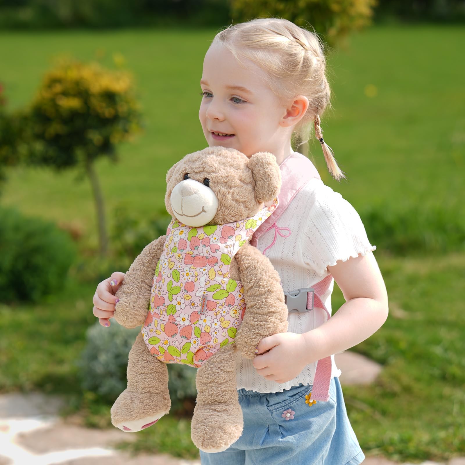 GAGAKU baby doll carrier front-pocket design keeps accessories organized during playtime.