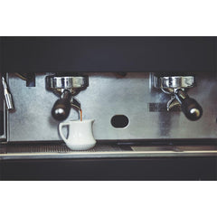 Gaggia decalcifier label close-up highlighting the approved formula for thorough descale.