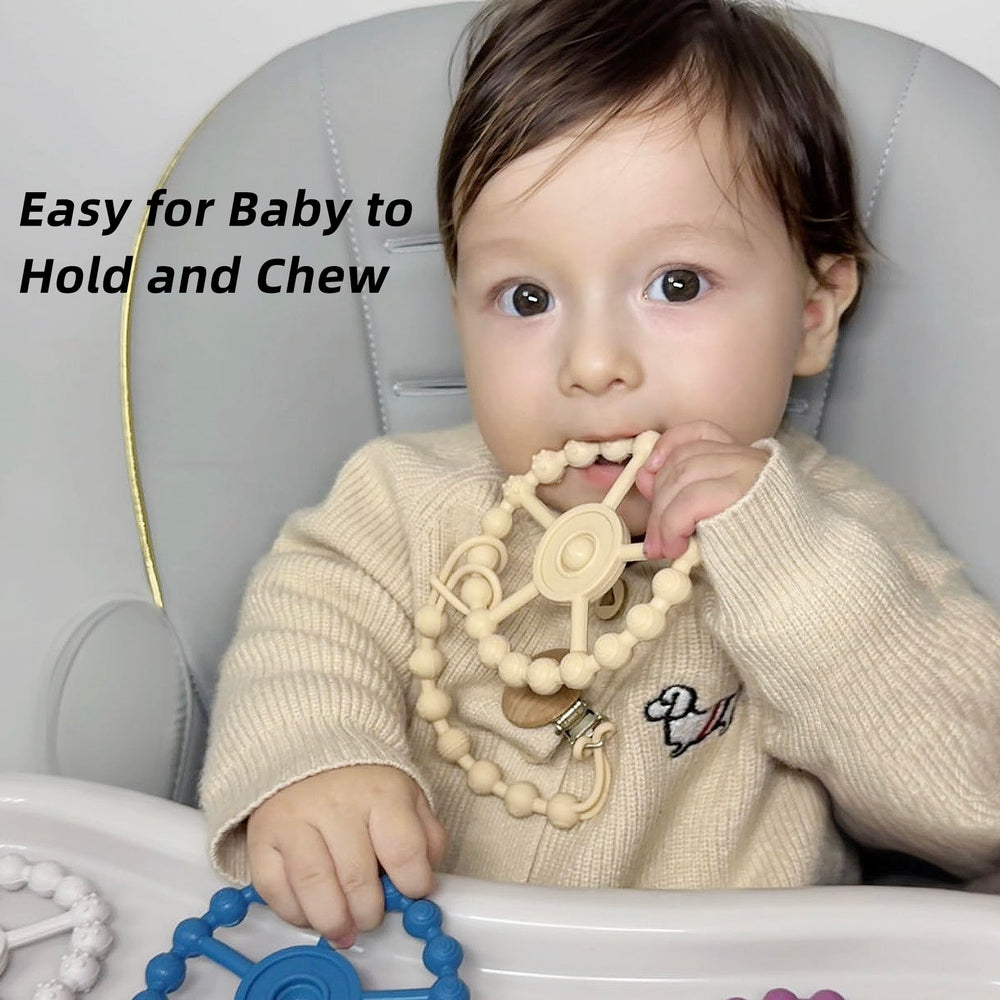 Gairssda silicone safety clip keeps teether attached to clothing.