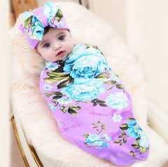 Galabloomer baby bow headband beside blanket for stylish newborn photos.