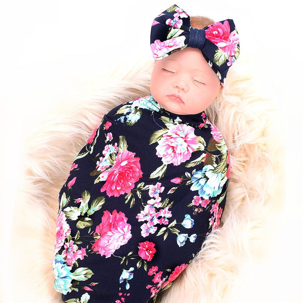 Galabloomer headband coordinating with navy rose print for stylish, comfy baby wear.
