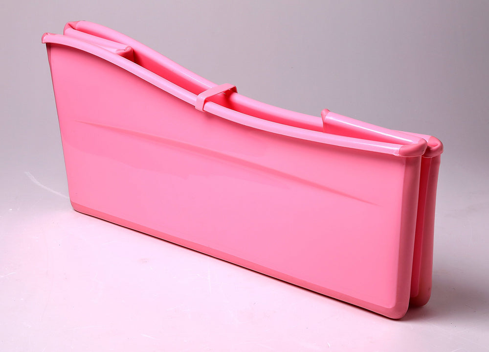Ganen Baby Bath Tub Portable Pink ready for travel in small spaces.