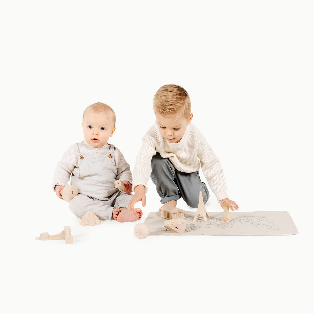Gathre wipeable baby changing mat with world map design for easy cleaning on the go
