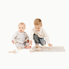 Gathre wipeable baby changing mat with world map design for easy cleaning on the go