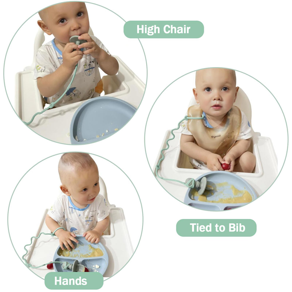 GAWAVAWA spoon and fork strapped to a high chair for easy access.