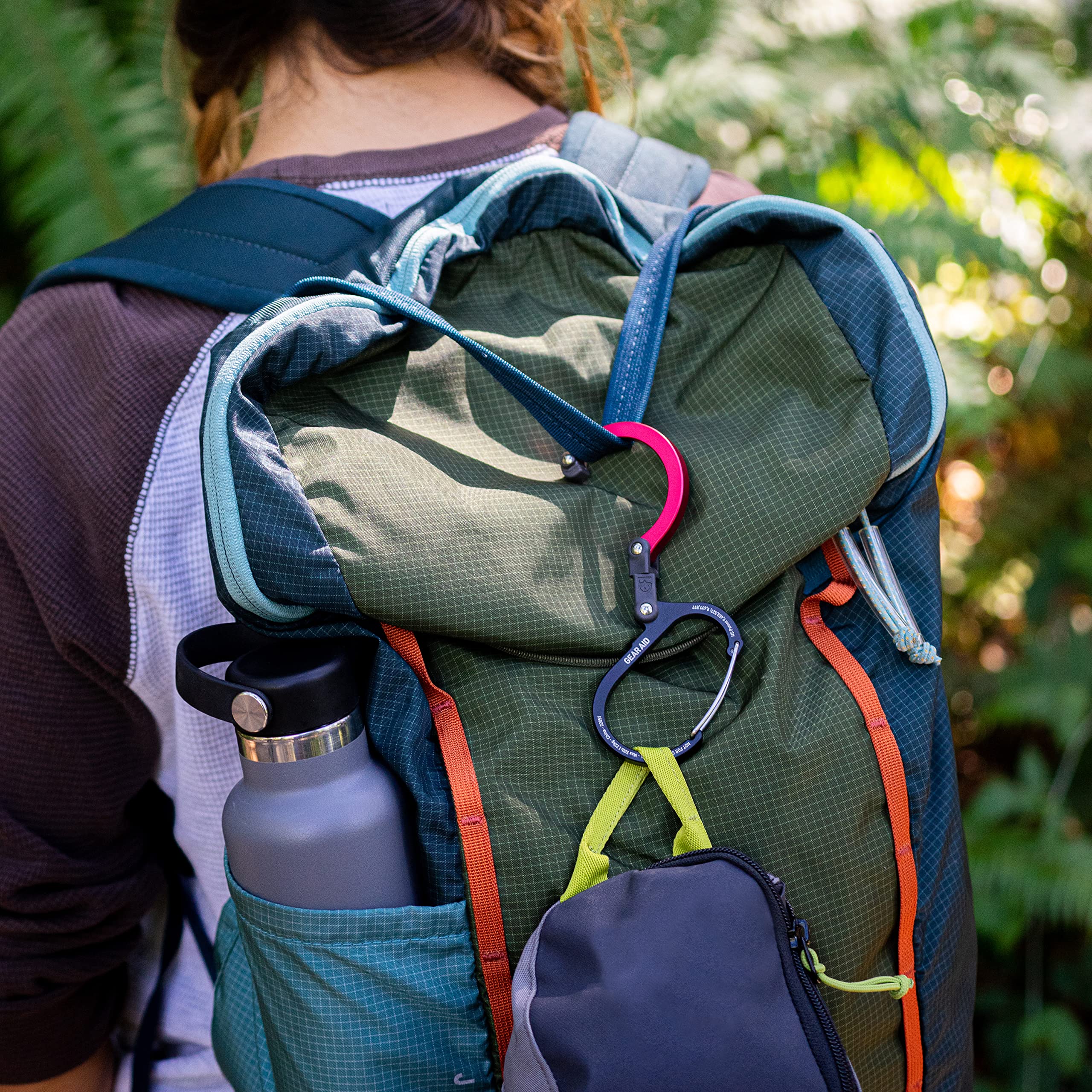 Gear Aid HEROCLIP Small on a diaper bag for organization.