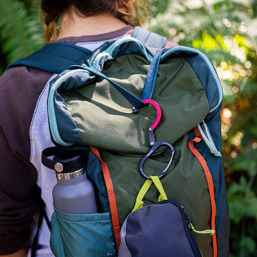 Gear Aid HEROCLIP Small on a diaper bag for organization.