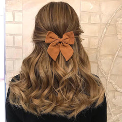 Gebelle sailor bow clip close-up beige-gold shows linen texture and durable fabric.