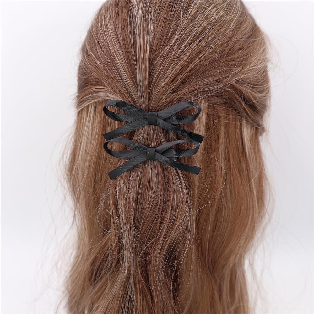 Gebelle satin bow clip macro shot highlights soft double-faced satin for gentle wear.