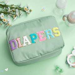 Geetery diaper caddy close-up shows durable chenille texture and glitter patch