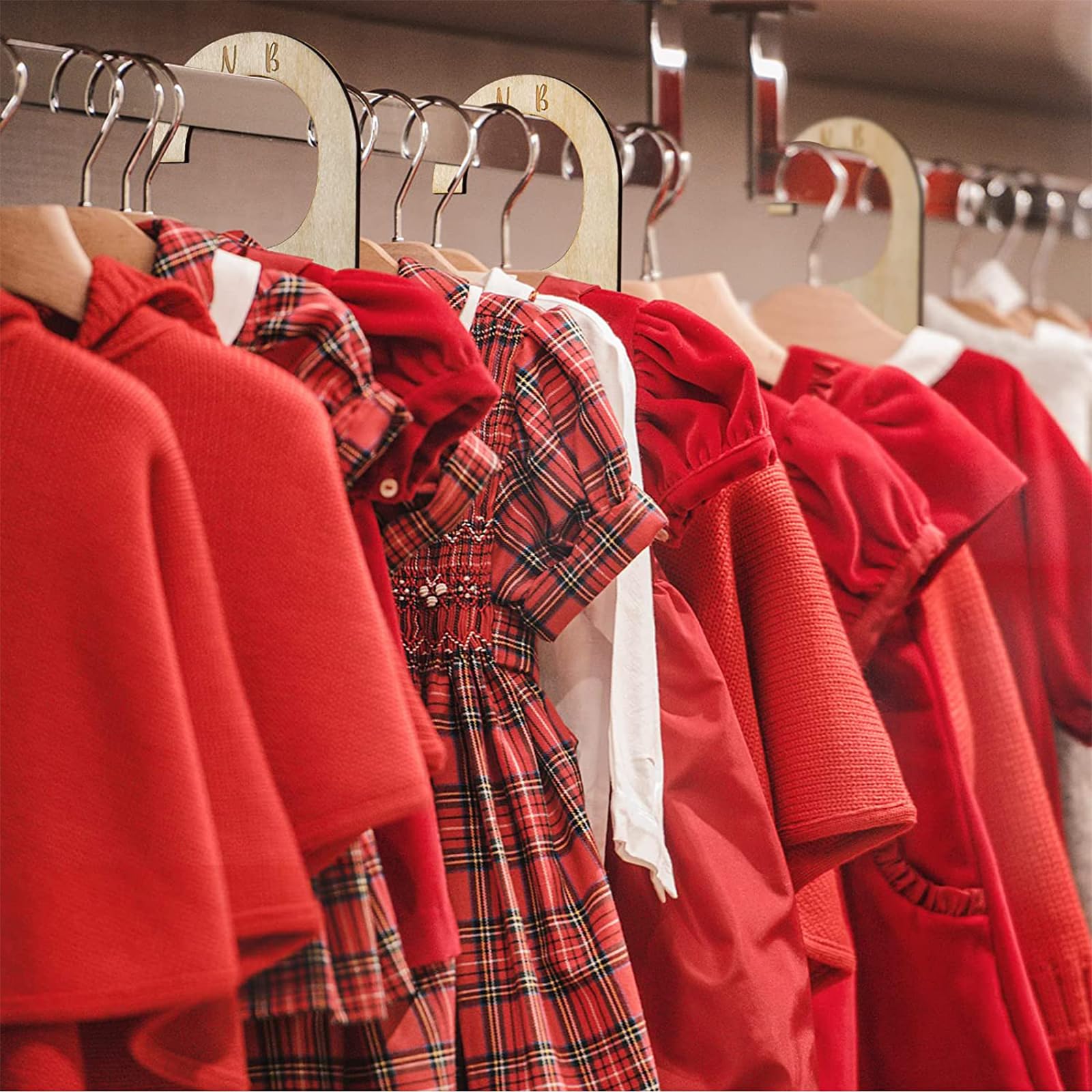 Generic Baby Closet Dividers brown with organized wardrobe idea keeps baby clothes neatly arranged.