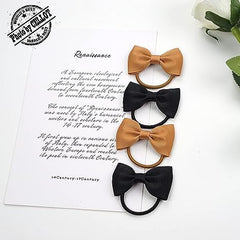 Generic baby girls hair accessories packaging showcases versatile color options for outfits.