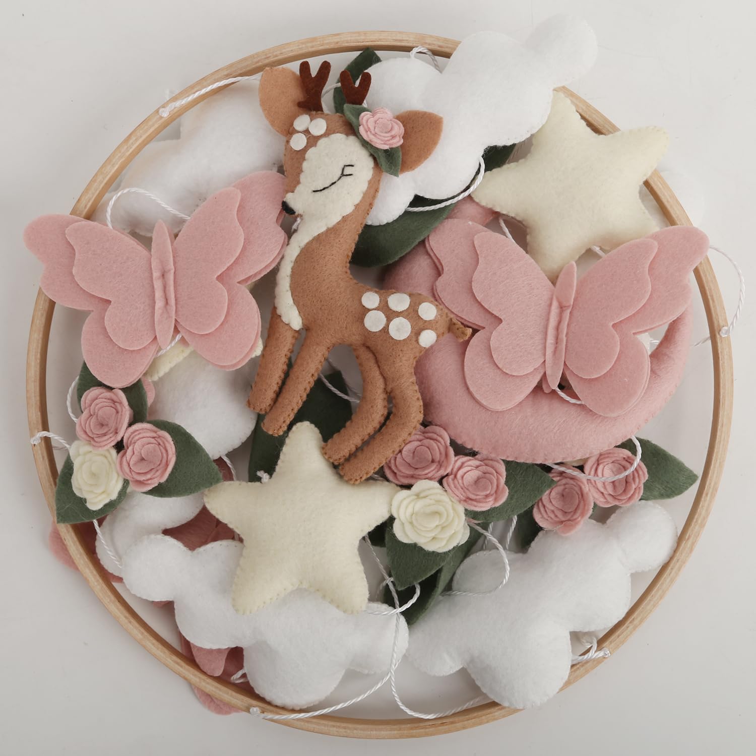 Generic Deer Baby Mobile with flowers provides soft nursery color for early visual exploration.