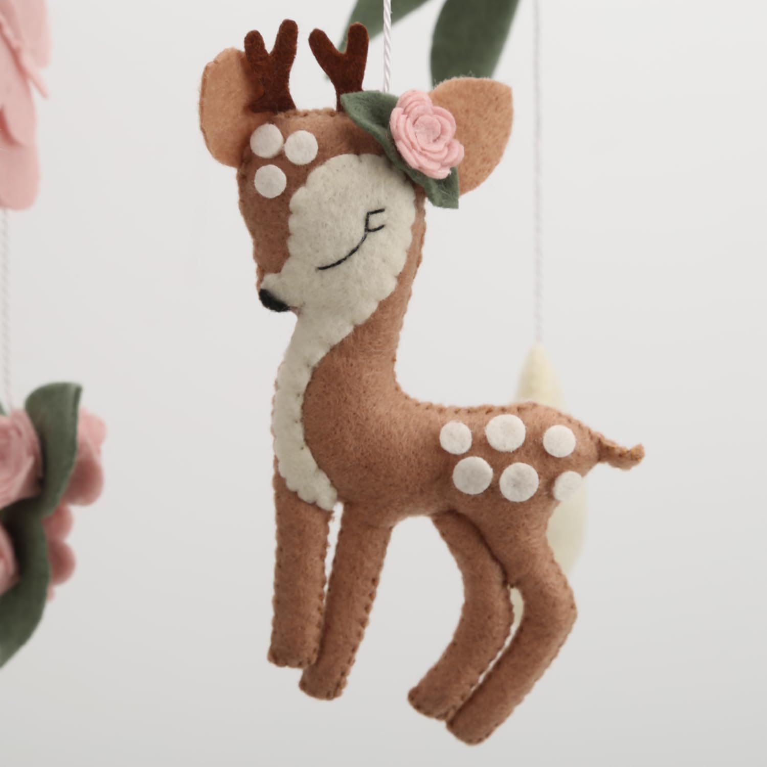 Generic Deer Baby Mobile for girls' nursery features a charming butterflies and floral motif.