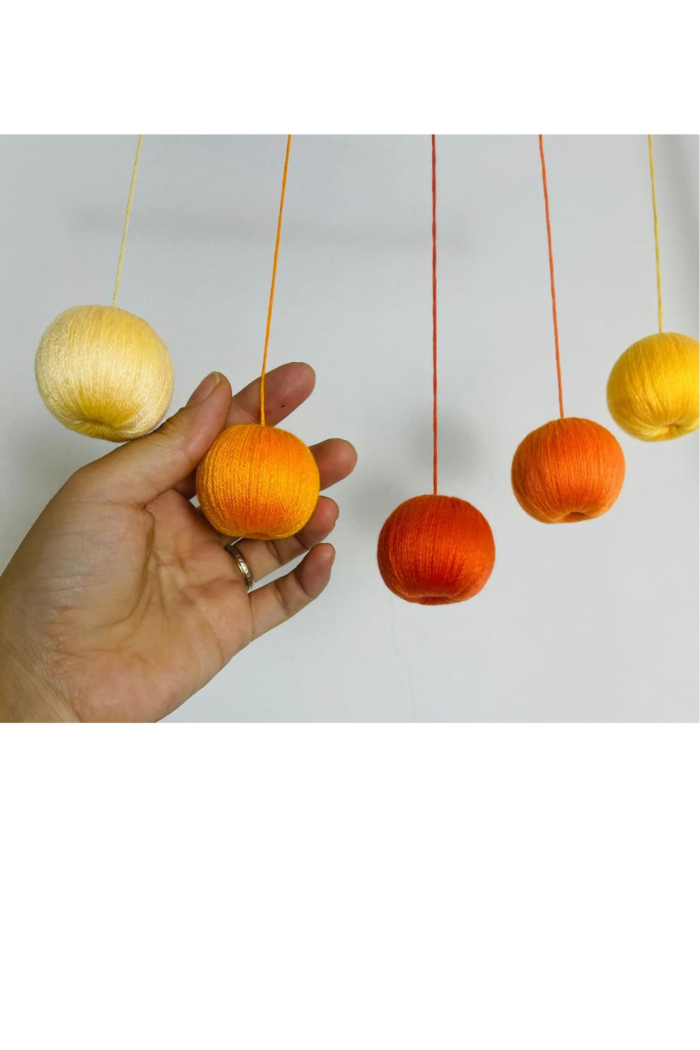 Generic handmade craftsman montessori mobile showcases quality craftsmanship