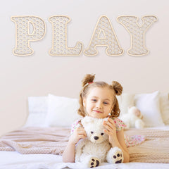 Generic Play Sign on shelf styling for nursery or kids' room decor.