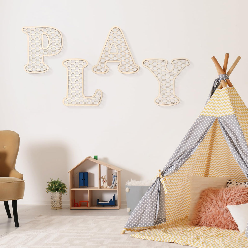 Generic Play room decor letters arranged to form phrases and words.