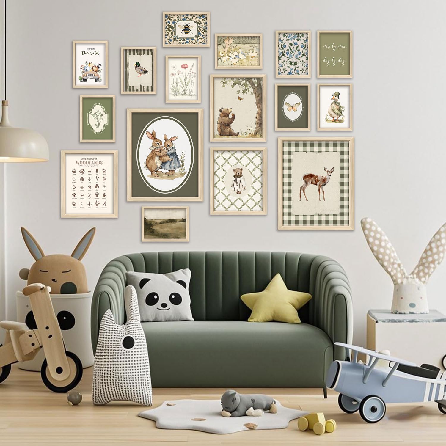 Generic woodland gallery-layout art aids easy, cohesive nursery wall styling.