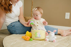 Genius Baby Toys Easter carrot crinkle texture for tactile exploration and curiosity.