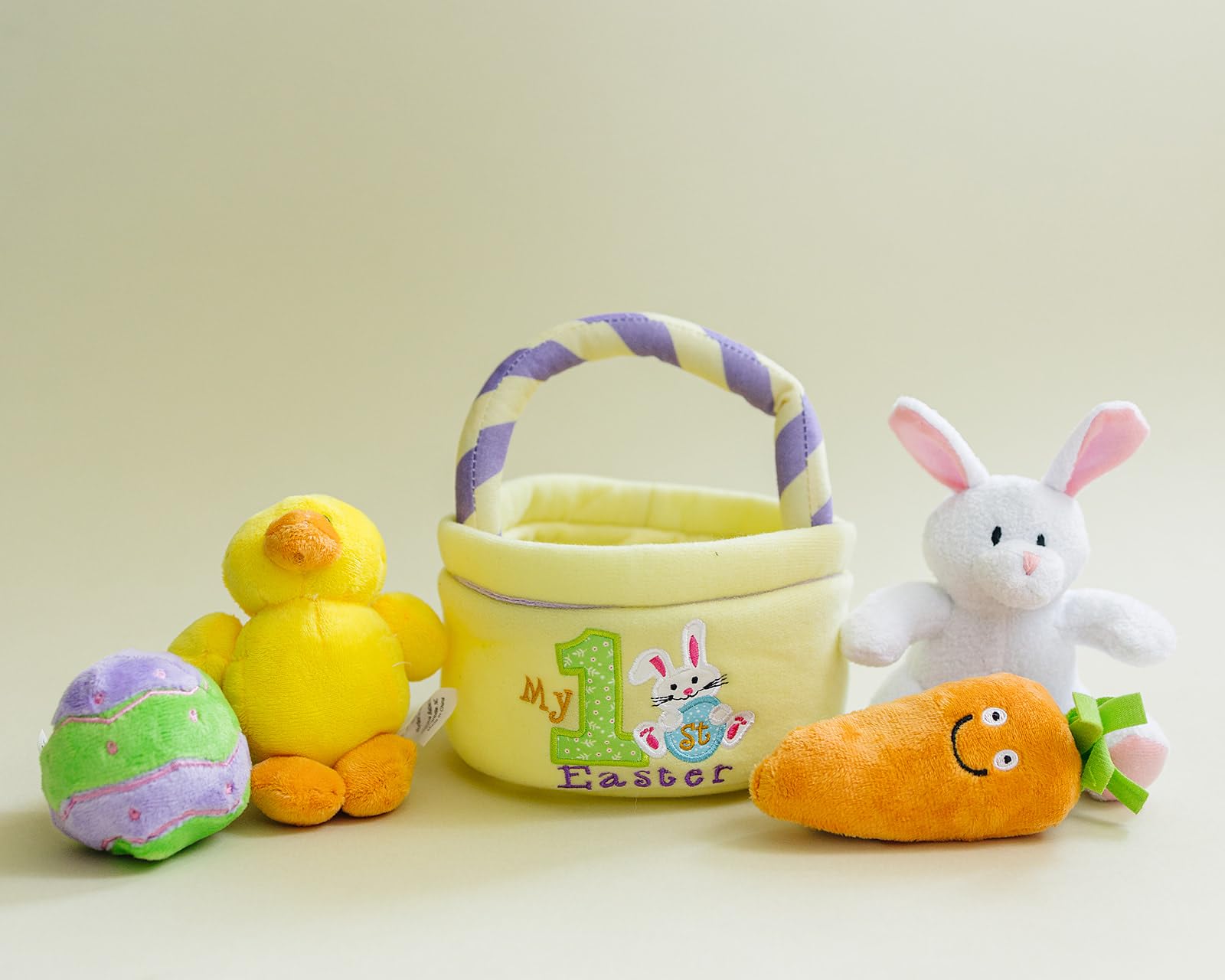 Genius Baby Toys Easter chick plush featuring squeaker for interactive sound and fine motor engagement.