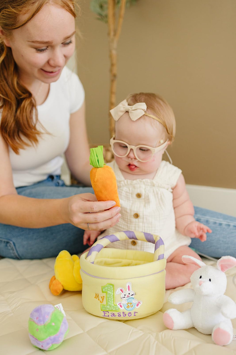 Genius Baby Toys Easter egg plush with rattle inviting shaking and grasping.