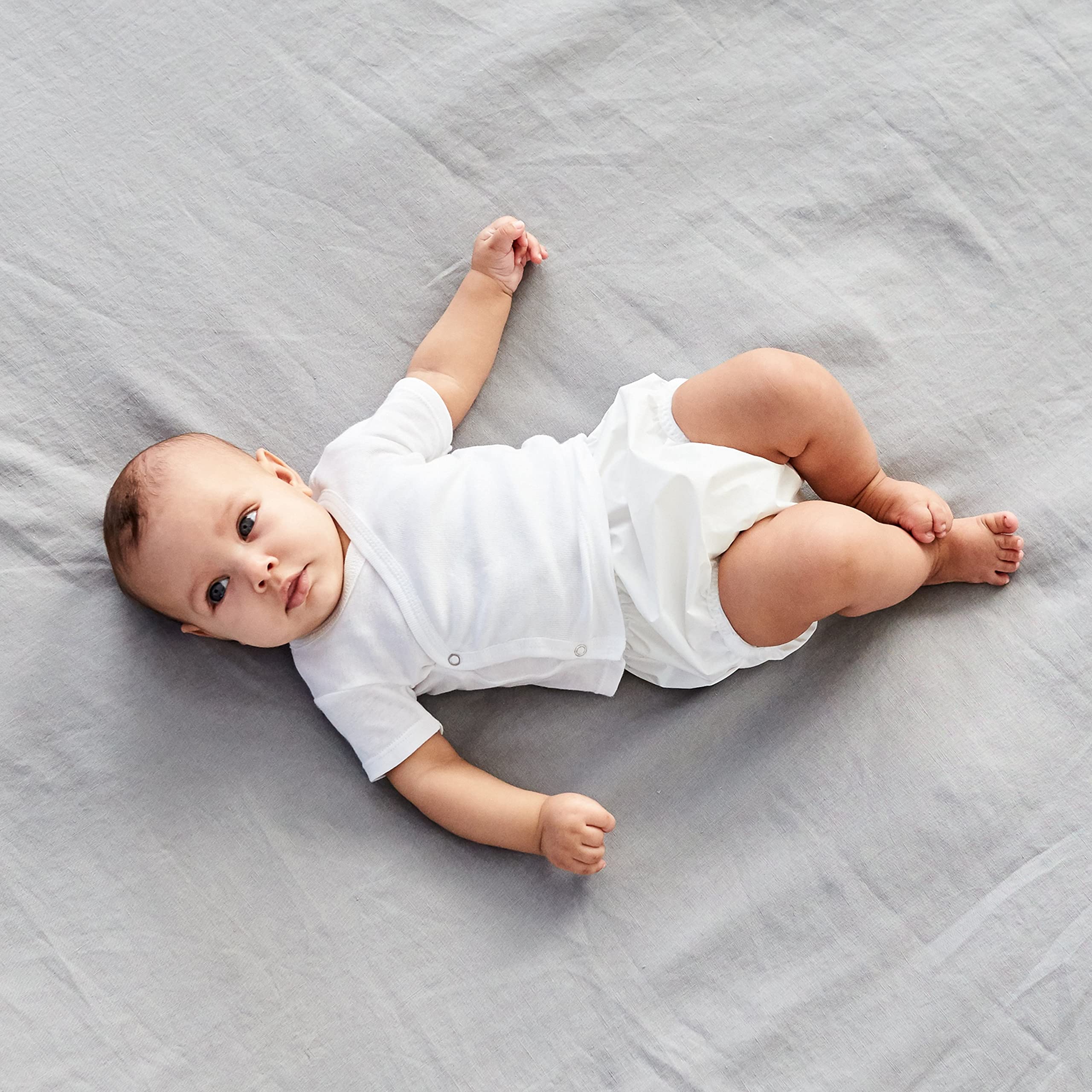 Gerber diaper cover used as protector over cloth diapers.