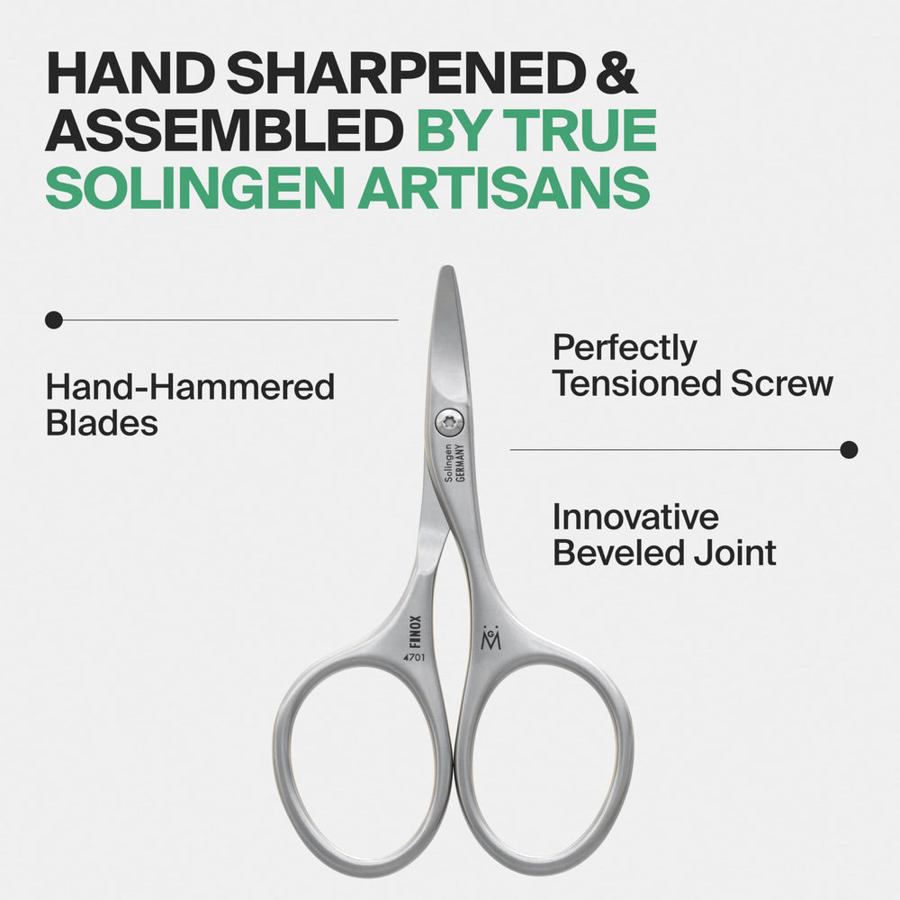 GERMANIKURE Solingen stainless steel scissors closeup showing durability and craft.