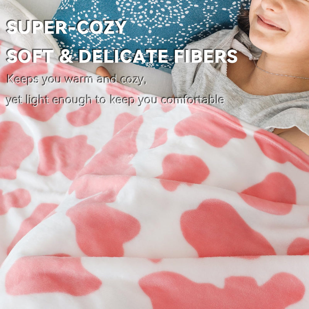 GEULAY pink cow blanket decorates bedroom with playful charm