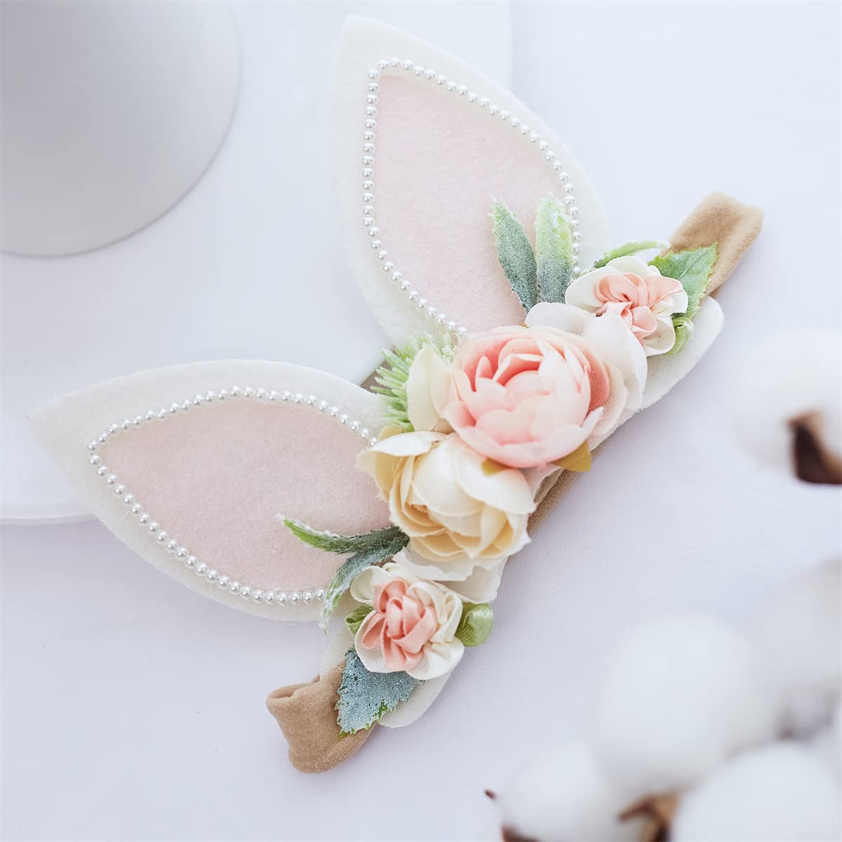 GEZISAN baby photography prop headband enhances newborn shoots.