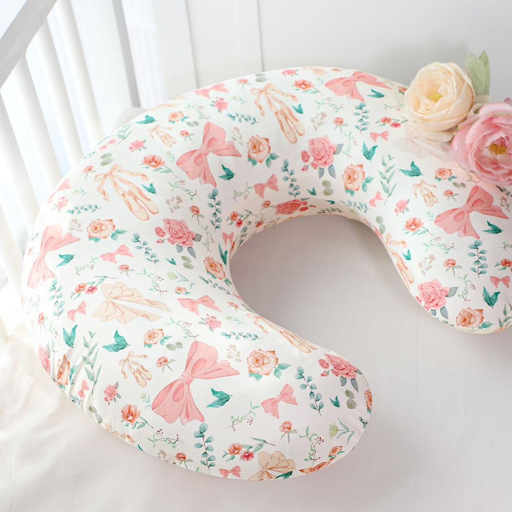 GFU nursing pillow cover showcases colorful bow and flower details for cheerful nursery decor