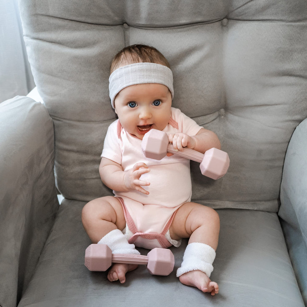 Giftty color-splash rattle-teether aids visual tracking and auditory stimulation.