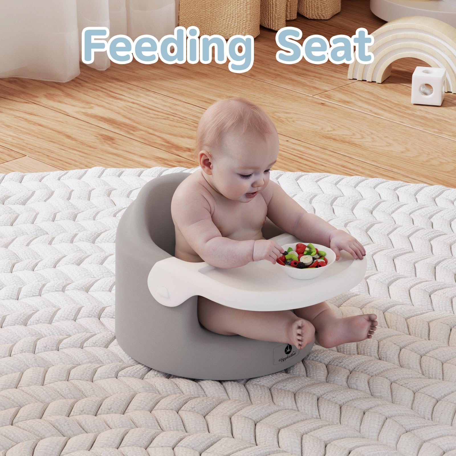 GiggleGlow baby floor seat gray in use at mealtime for focused feeding and play.