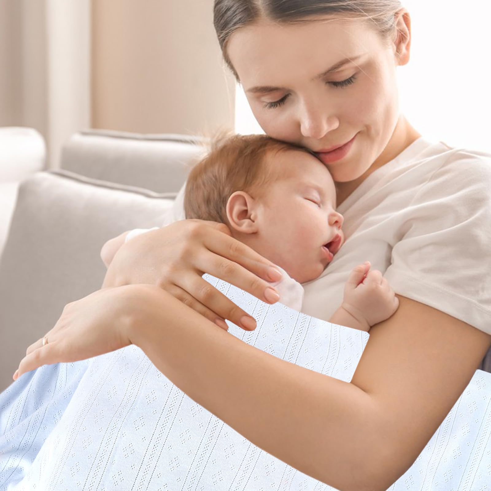 Gina Era knit baby receiving blanket blue stitching detail shows reinforced seams for durable washing.