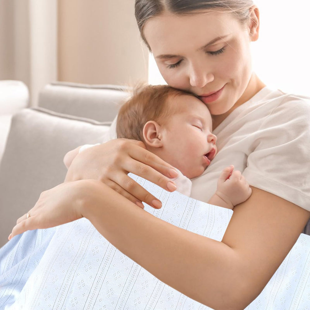 Gina Era knit baby receiving blanket blue stitching detail shows reinforced seams for durable washing.