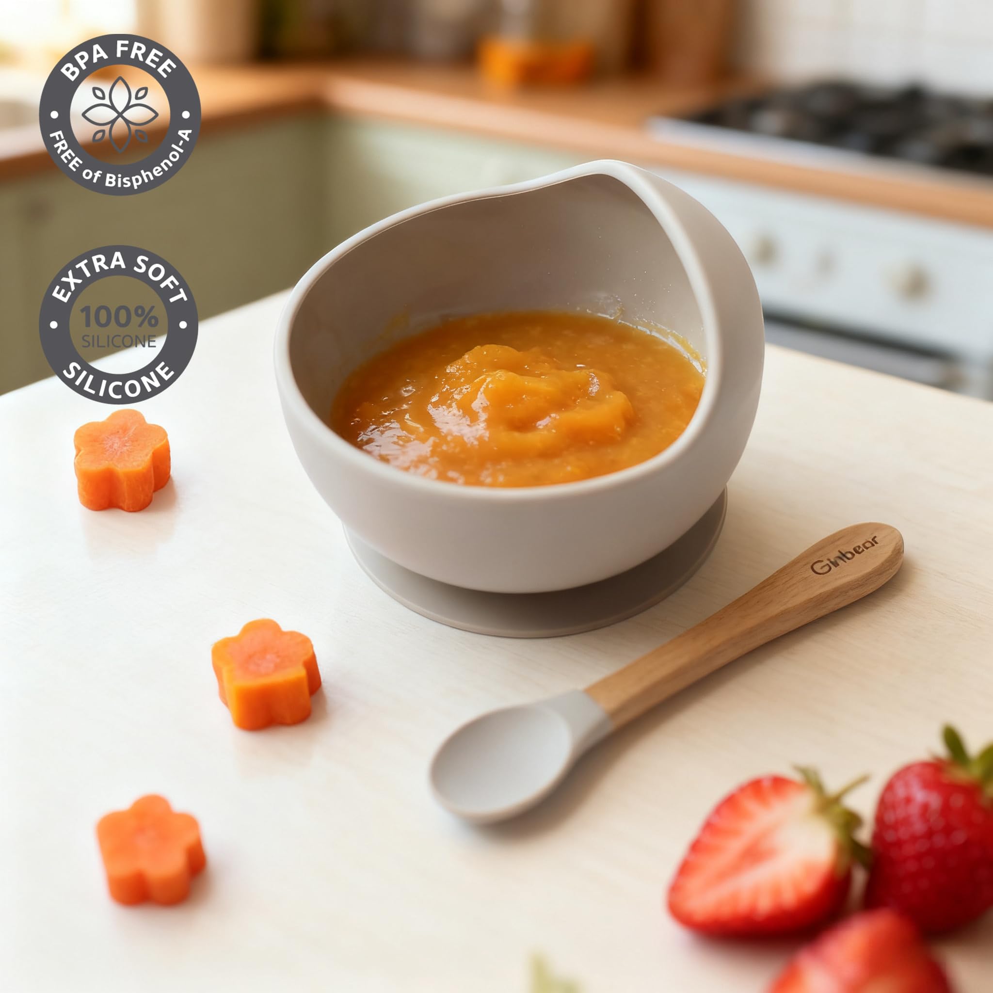 Ginbear baby bowl raised edge helps guide food and reduce spills.