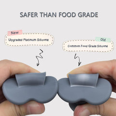 Ginbear platinum silicone baby spoon in pink with comfortable grip.