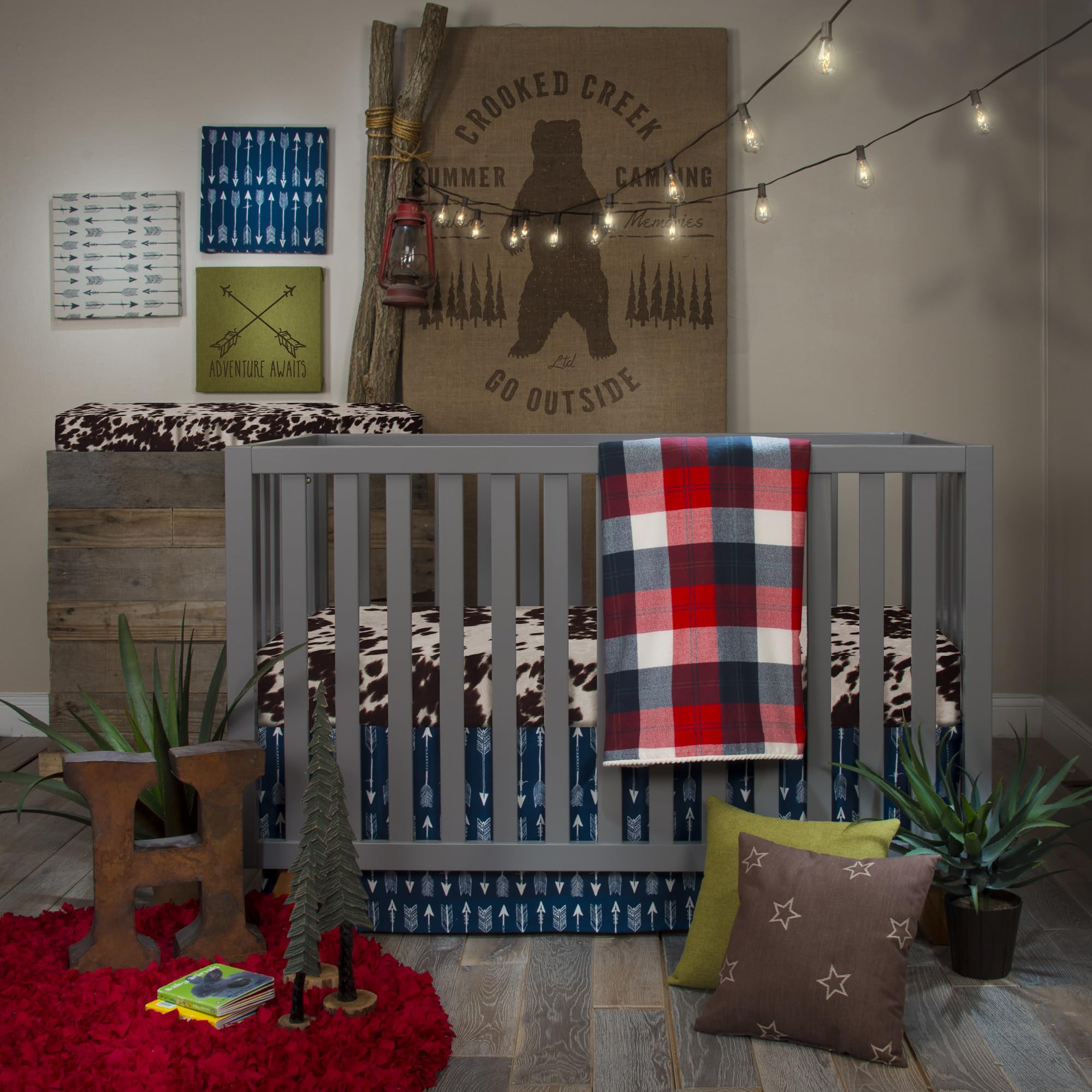 Glenna Jean Black Cow crib sheet closeup—soft touch for baby sleep.