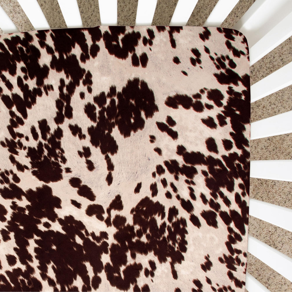 Glenna Jean Brown Cow crib sheet closeup—ultra-soft fabric supports comfy naps.