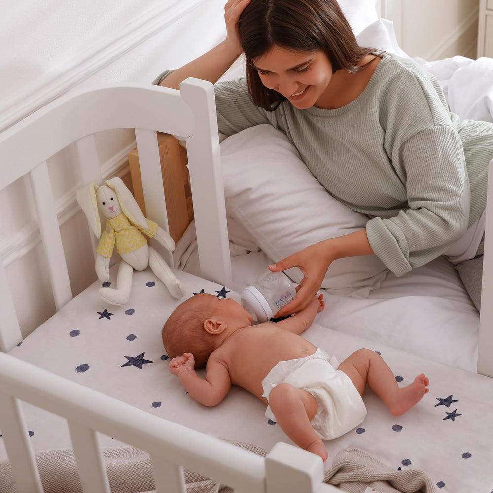 GLLQUEN BABY astronaut-themed nursery decor complements photos and room design.