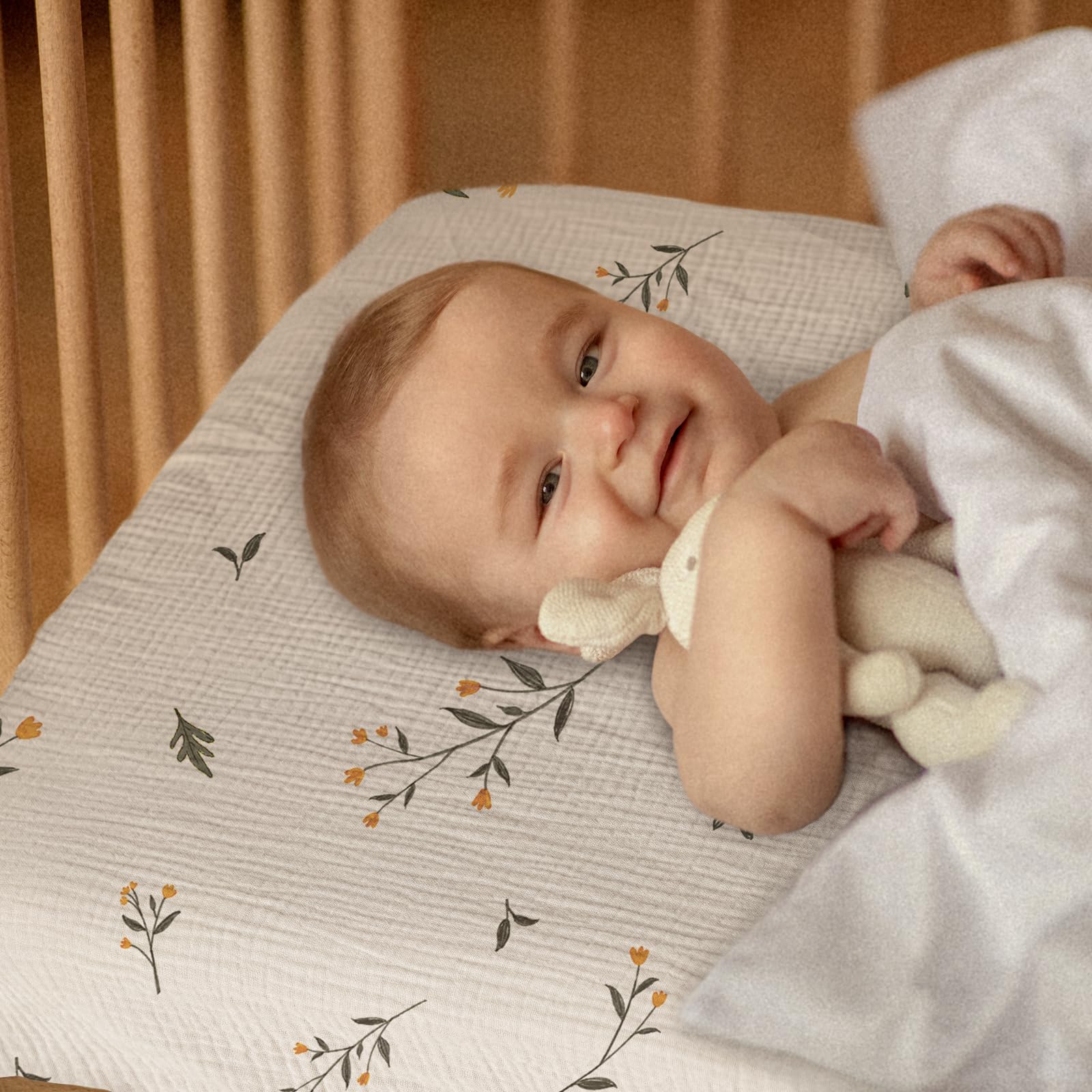 Gllquen Baby mini-crib-sheets with elastic band ensure a secure, quick fit