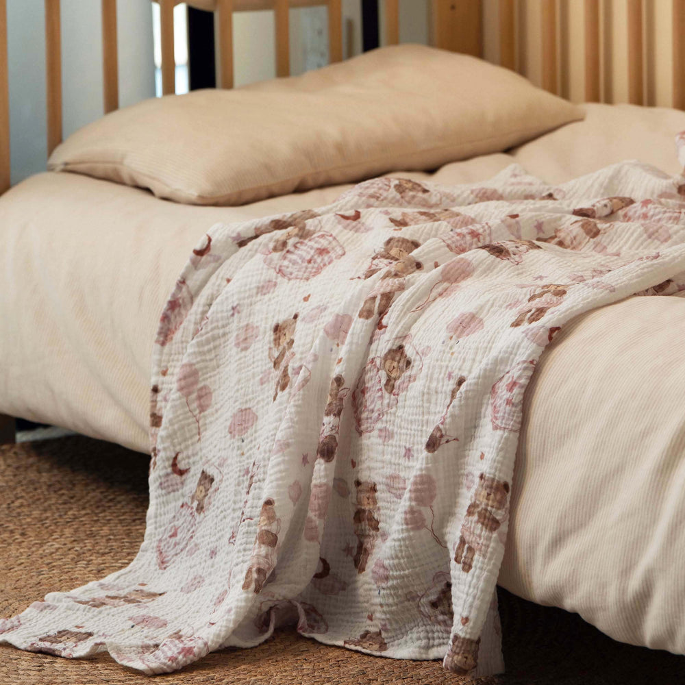 GLLQUEN BABY multi-use blanket doubles as burp cloth or nursing cover.