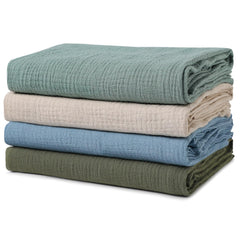 GLLQUEN BABY muslin swaddle blanket 4-pack showing soft cotton fabric for newborn comfort.