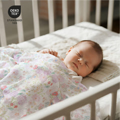 GLLQUEN BABY muslin swaddle blanket folded for packing convenience.