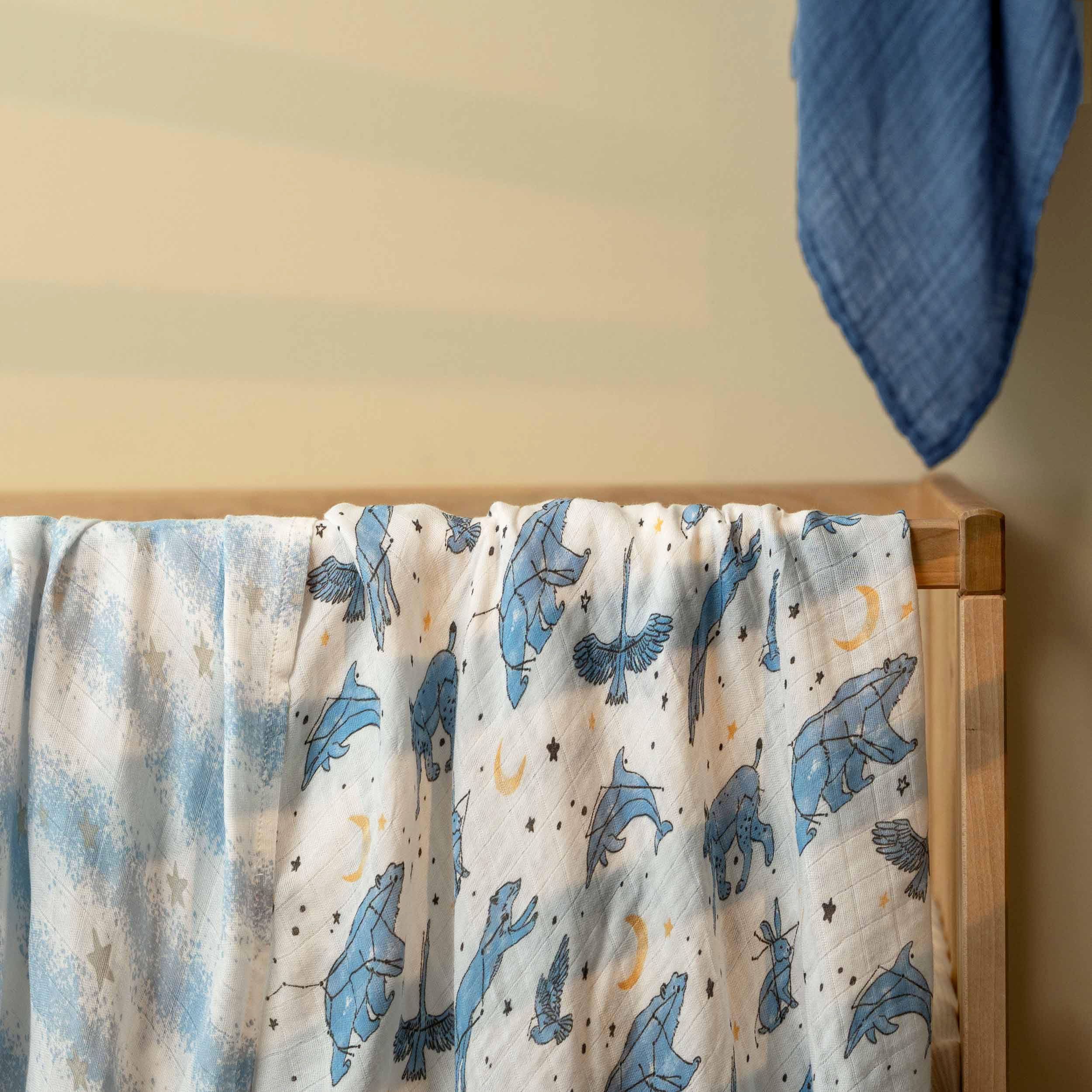 GLLQUEN BABY cosmos 90x100cm blanket demonstrates generous swaddle size and coverage