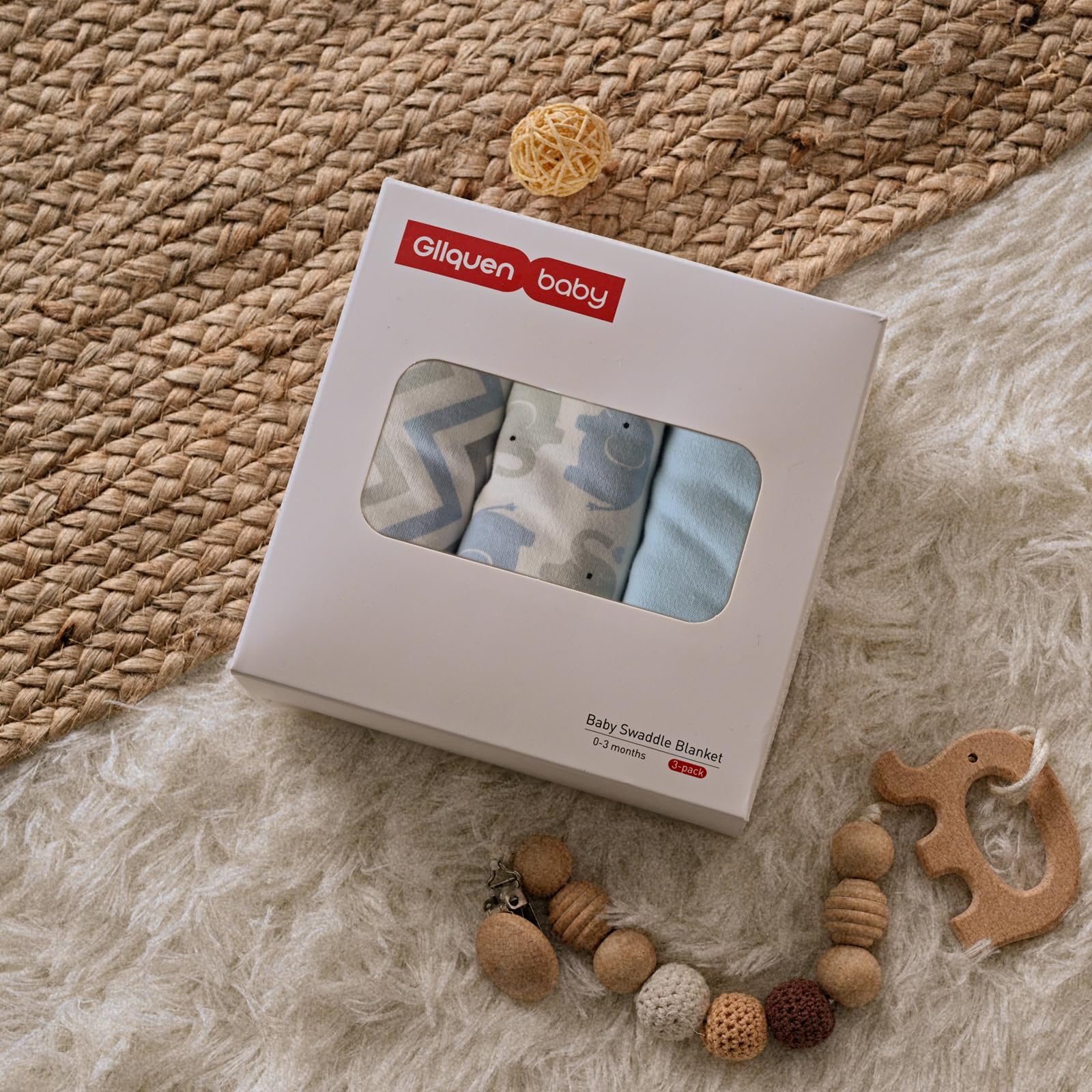GLLQUEN BABY swaddle on baby in crib illustrates snug wrap