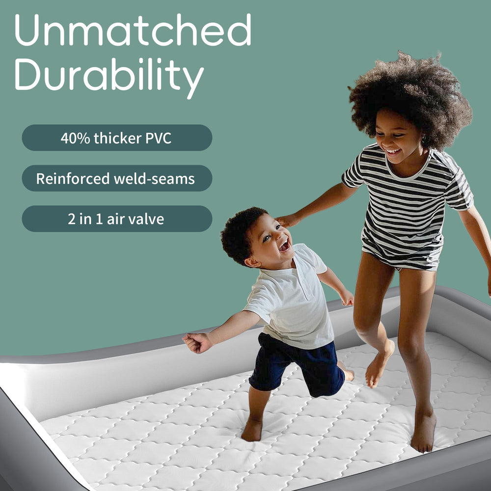 GloTika surround safety bumpers protecting toddler during sleepovers